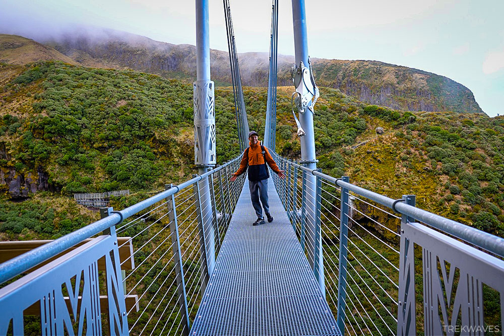 walking across manganui gorge suspension bridge mt taranaki